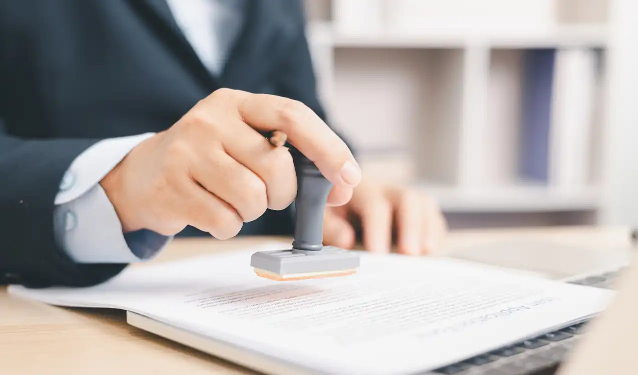 Auction contract breach consequences — solicitor explaining legal risks of pulling out after winning property auction