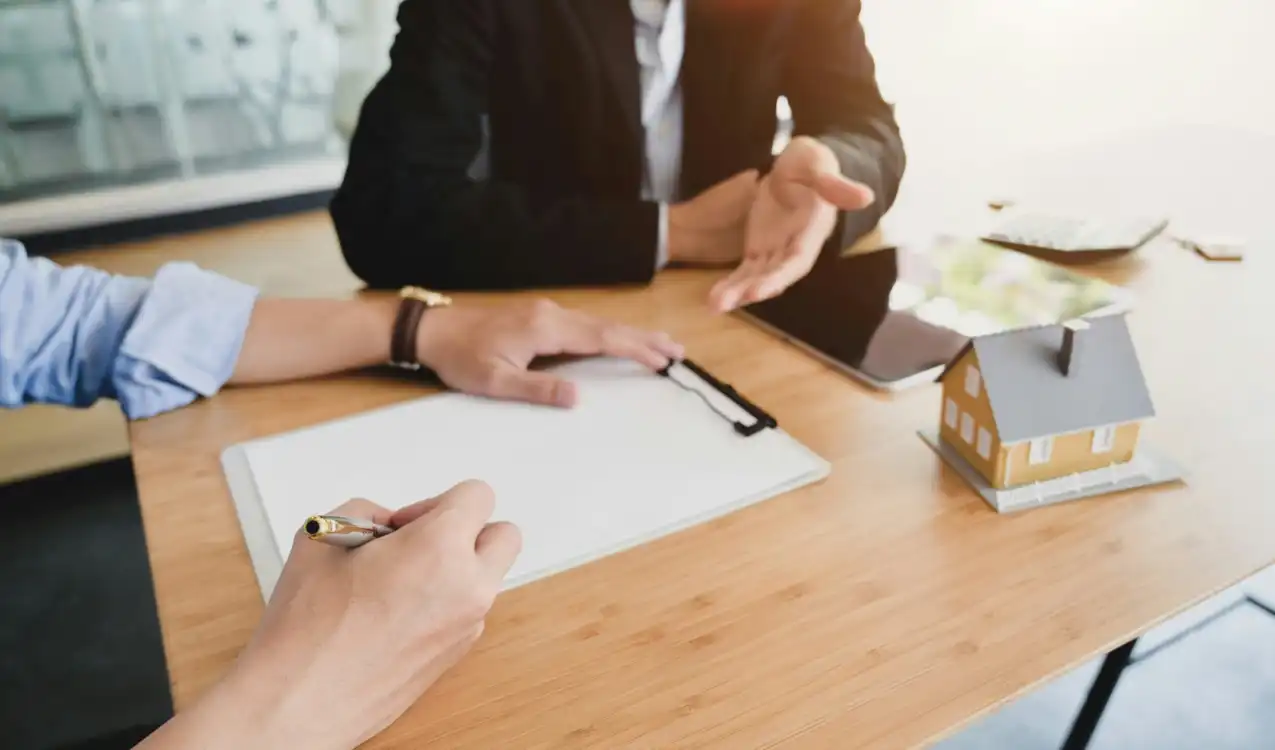 Memorandum of sale and auction contract showing buyer name at property auction in the UK