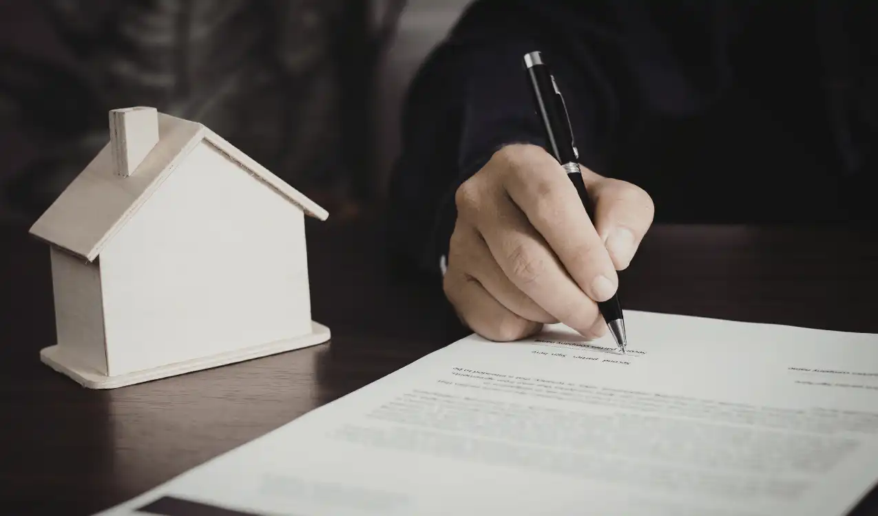 Auction legal pack with property searches documents laid out on desk