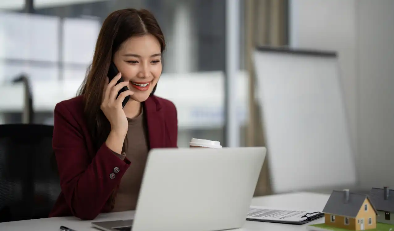 Client contacting their auction conveyancing solicitor to discuss property purchase deadlines