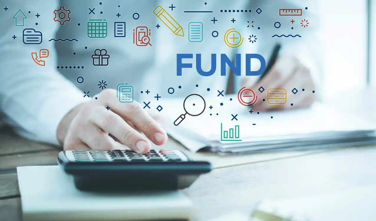 Professional reviewing a property source of funds document in an office.