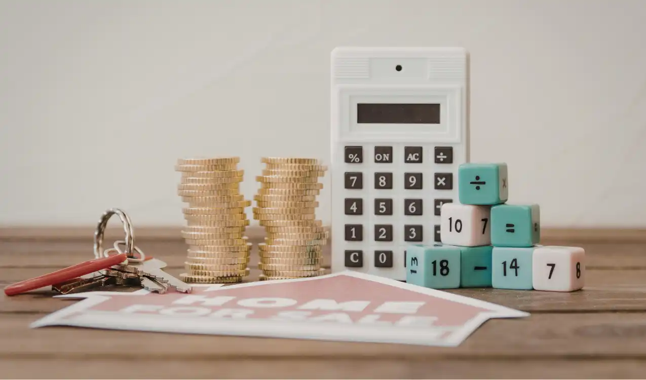 Buyer reviewing auction fees and extra costs at a UK property auction — auction fees explained