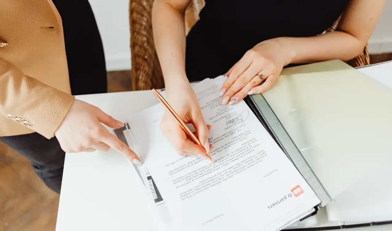 Solicitor reviewing auction special conditions to identify hidden costs of buying property at auction