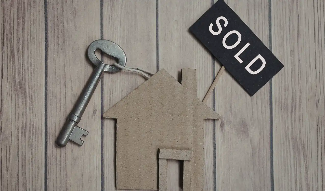 Buyer reviewing leasehold documents after buying a leasehold flat at auction in the UK