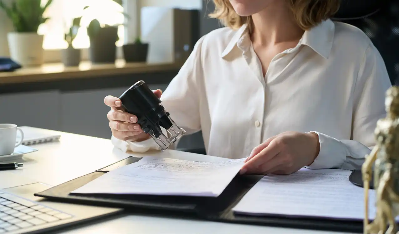 Solicitor reviewing auction contract documents after the hammer falls — change solicitor after auction