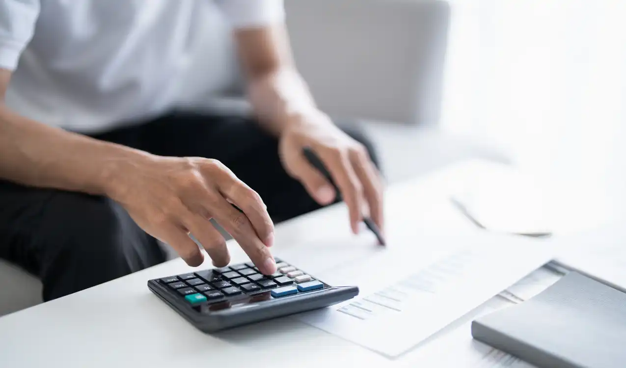 Buyer reviewing unpaid service charges and leasehold arrears after auction purchase