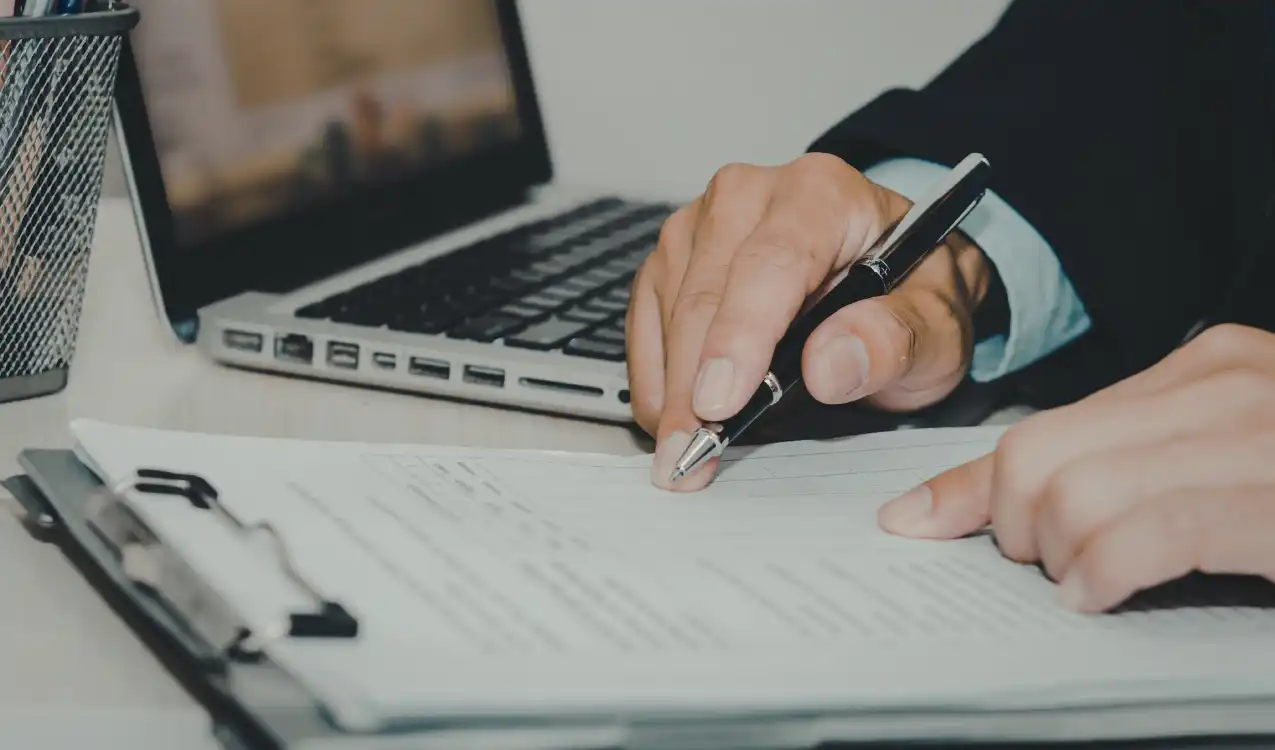 Solicitor reviewing unregistered land deeds before buying property at auction